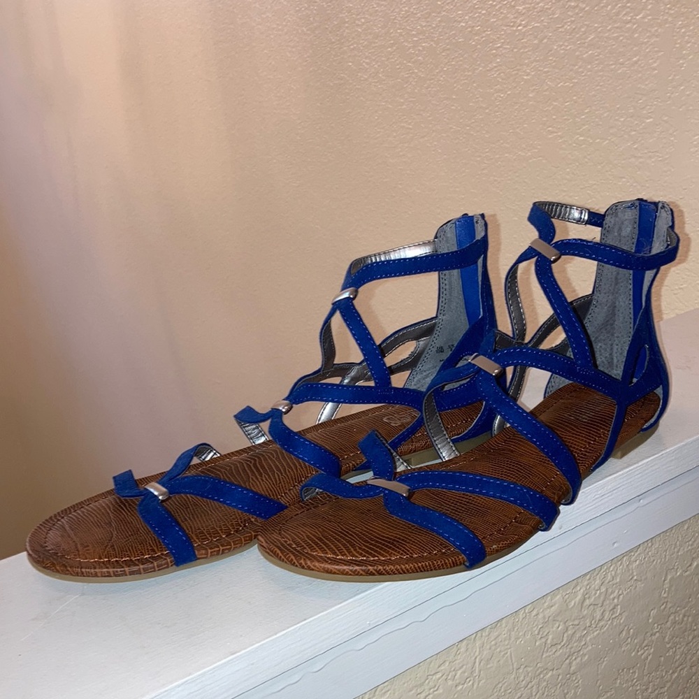 Carlos by Carlos Santana, Size 10. Barely used. Color Blue with silver metal.